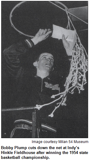 Bobby Plump cuts down the net at Indy’s Hinkle Fieldhouse after winning the 1954 state basketball championship. Image courtesy Milan 54 Museum.