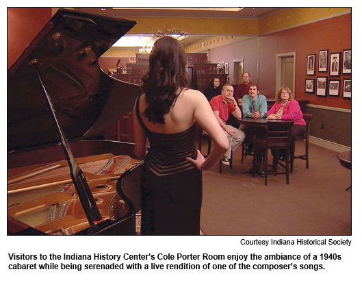 Visitors to the Indiana History Center’s Cole Porter Room enjoy the ambiance of a 1940s cabaret while being serenaded with a live rendition of one of the composer’s songs. 
Courtesy Indiana Historical Society.