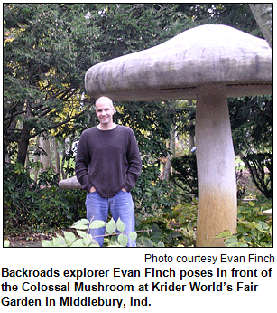 Backroads explorer Evan Finch poses in front of the Colossal Mushroom at Krider World’s Fair Garden in Middlebury, Ind. Photo courtesy 
