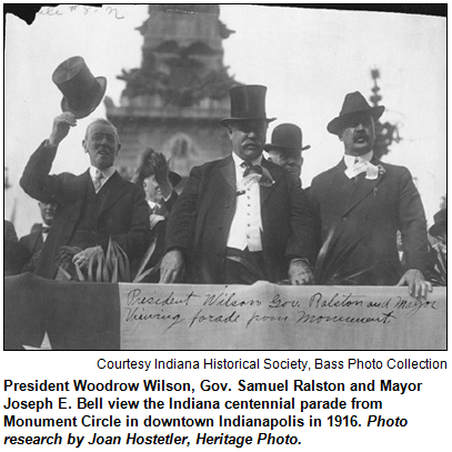 President Woodrow Wilson, Gov. Samuel Ralston and Mayor Joseph E. Bell view the Indiana centennial parade from Monument Circle in downtown Indianapolis in 1916. Photo research by Joan Hostetler, Heritage Photo. Image courtesy Indiana Historical Society, Bass Photo Collection.