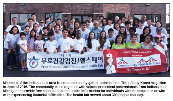 Members of the Indianapolis Korean community gather outside the office of Indy Korea magazine in June of 2016 for a health fair.  
