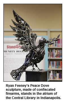 Ryan Feeney’s Peace Dove sculpture, made of confiscated firearms, stands in the atrium of the Central Library in Indianapolis.
