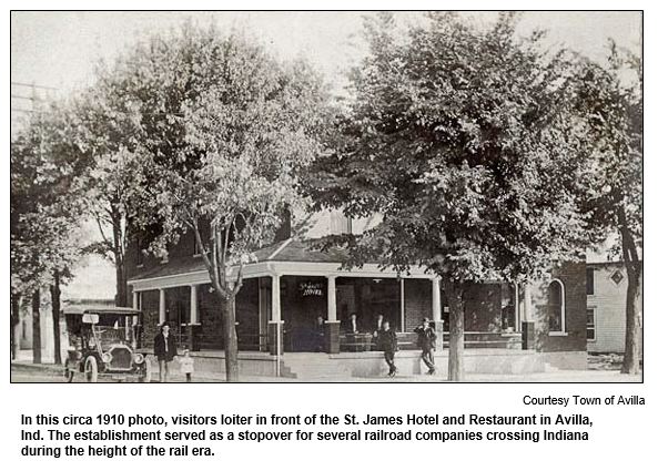 In this circa 1910 photo, visitors loiter in front of the St. James Hotel and Restaurant in Avilla, Ind. The establishment served as a stopover for several railroad companies crossing Indiana during the height of the rail era.  
Courtesy Town of Avilla.