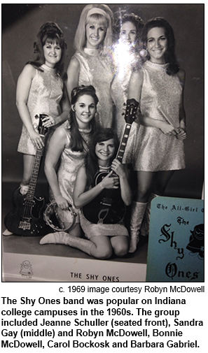 The Shy Ones band was popular on Indiana college campuses in the 1960s. The group included Jeanne Schuller (seated front), Sandra Gay (middle) and Robyn McDowell, Bonnie McDowell, Carol Bockosk and Barbara Gabriel. Circa 1969 image courtesy Robyn McDowell.